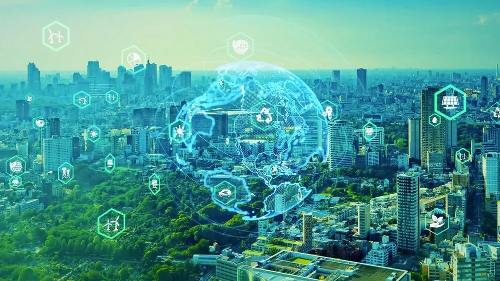A panoramic view of a modern city skyline and lush green parkland with a digital globe overlay and interconnected hexagonal icons representing renewable energy, recycling, and sustainable technology.