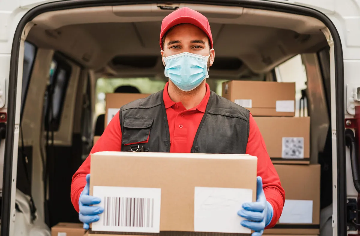 Portrait,Of,Delivery,Man,Wearing,Face,Protective,Mask,For,Coronavirus