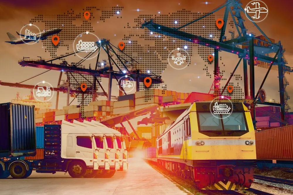 A busy shipping port filled with cargo containers, cranes, a row of semi-trucks, and a freight train, overlaid with a digital world map and glowing logistical icons.